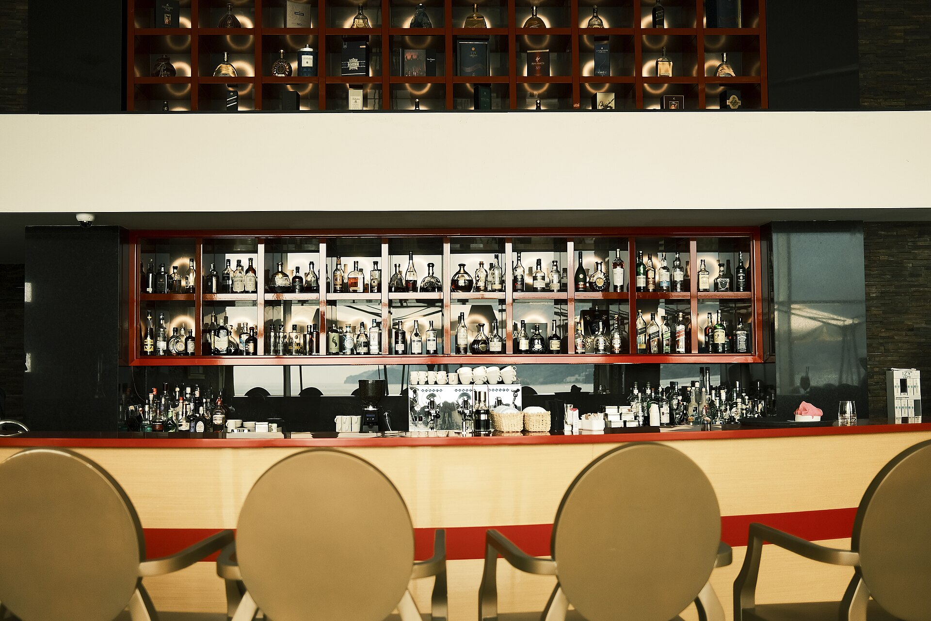 Polished modern bar interior used as an illustrative contrast